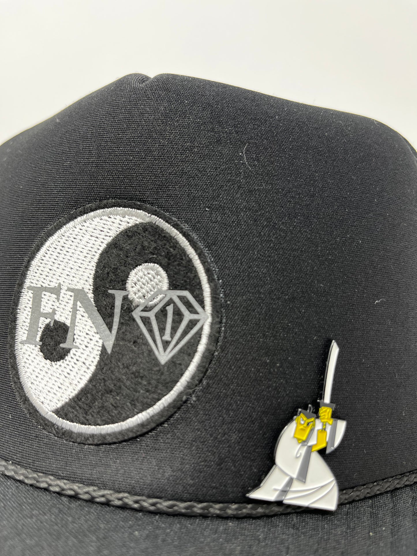 Balance trucker hat w/ samurai Jack pin